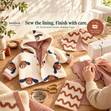 Hands sew gingham lining at a domestic sewing machine. The hooded jacket guide includes 22 illustrated construction steps.