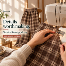 Pocket-making close-up showing rich cocoa-brown and warm cream windowpane plaid wide-leg pants with elastic waist and front pockets. Hemlark digital sewing pattern.