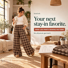 Final desire/styling image showing rich cocoa-brown and warm cream windowpane plaid wide-leg pants with elastic waist and front pockets. Hemlark digital sewing pattern.